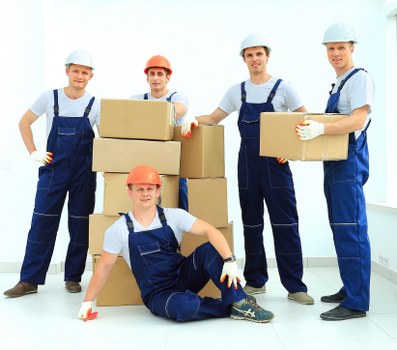 House movers assisting a Docklands apartment relocation with careful packing and loading