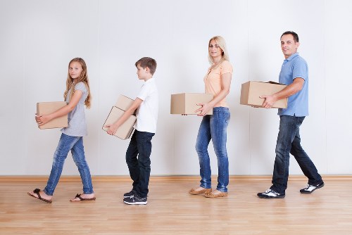 Removalists handling apartment furniture near Docklands high-rises