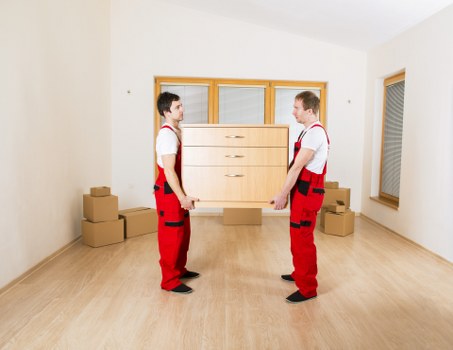 Worker assessing moving hazards before lifting