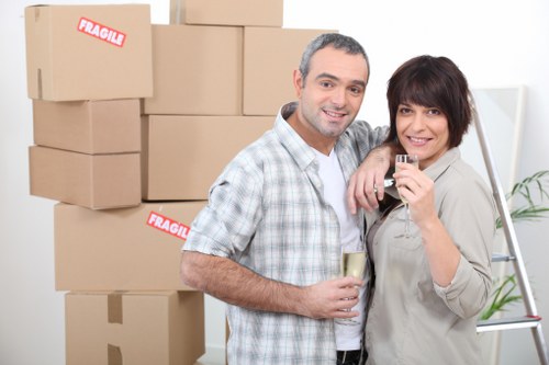 Moving boxes and desks in a modern Docklands office setting